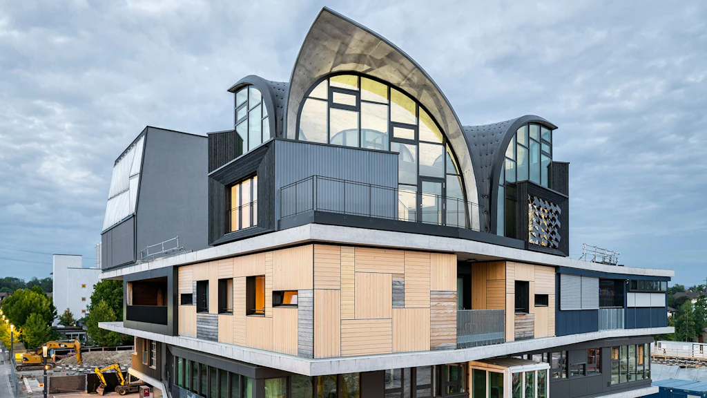 L'image montre le bâtiment modulaire de recherche et d'innovation NEST de l'Empa.